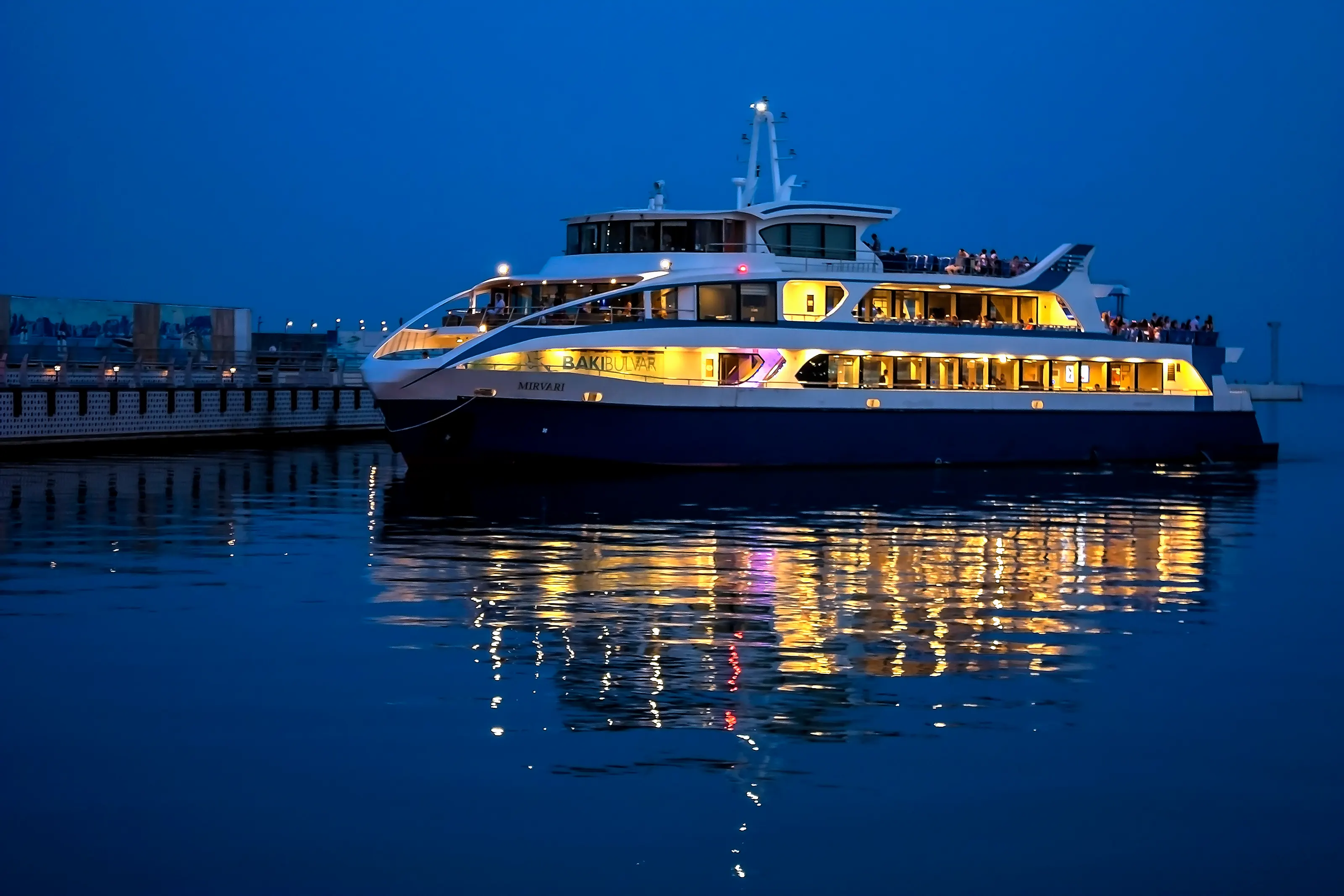Caspian Cruise Ship Mirvari Caspian cruise ship “Mirvari” at the pier at night with its dim lights.
