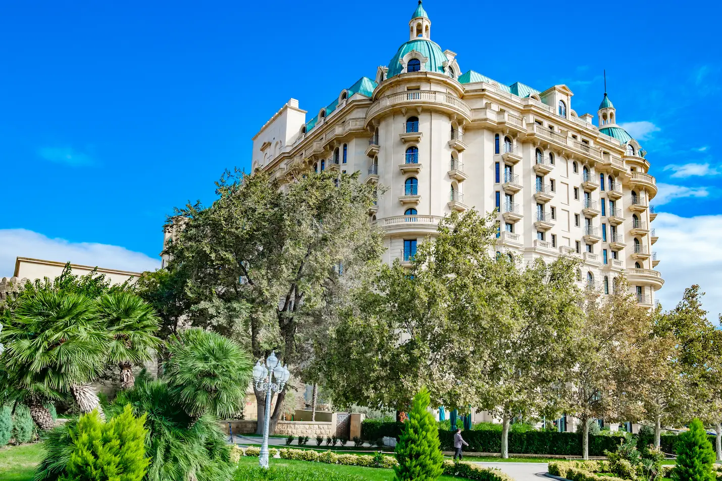 Four Seasons Hotel Baku Four Seasons Hotel Baku amid lush greenery.