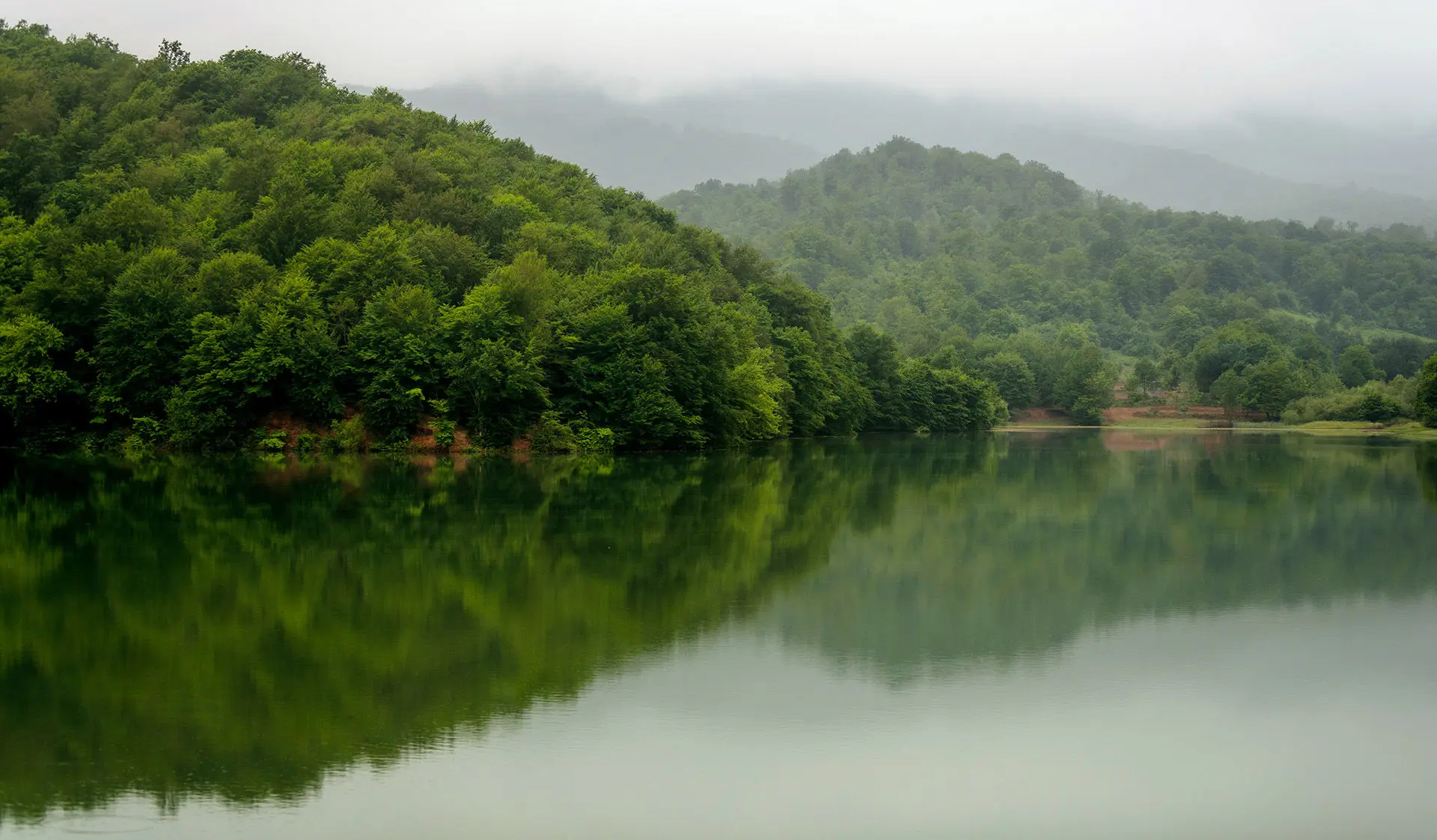 Lake Chanlibel Quba Azerbaijan Scenic view of Lake Chanlibel in Quba, Azerbaijan, in cloudy and slightly misty weather.