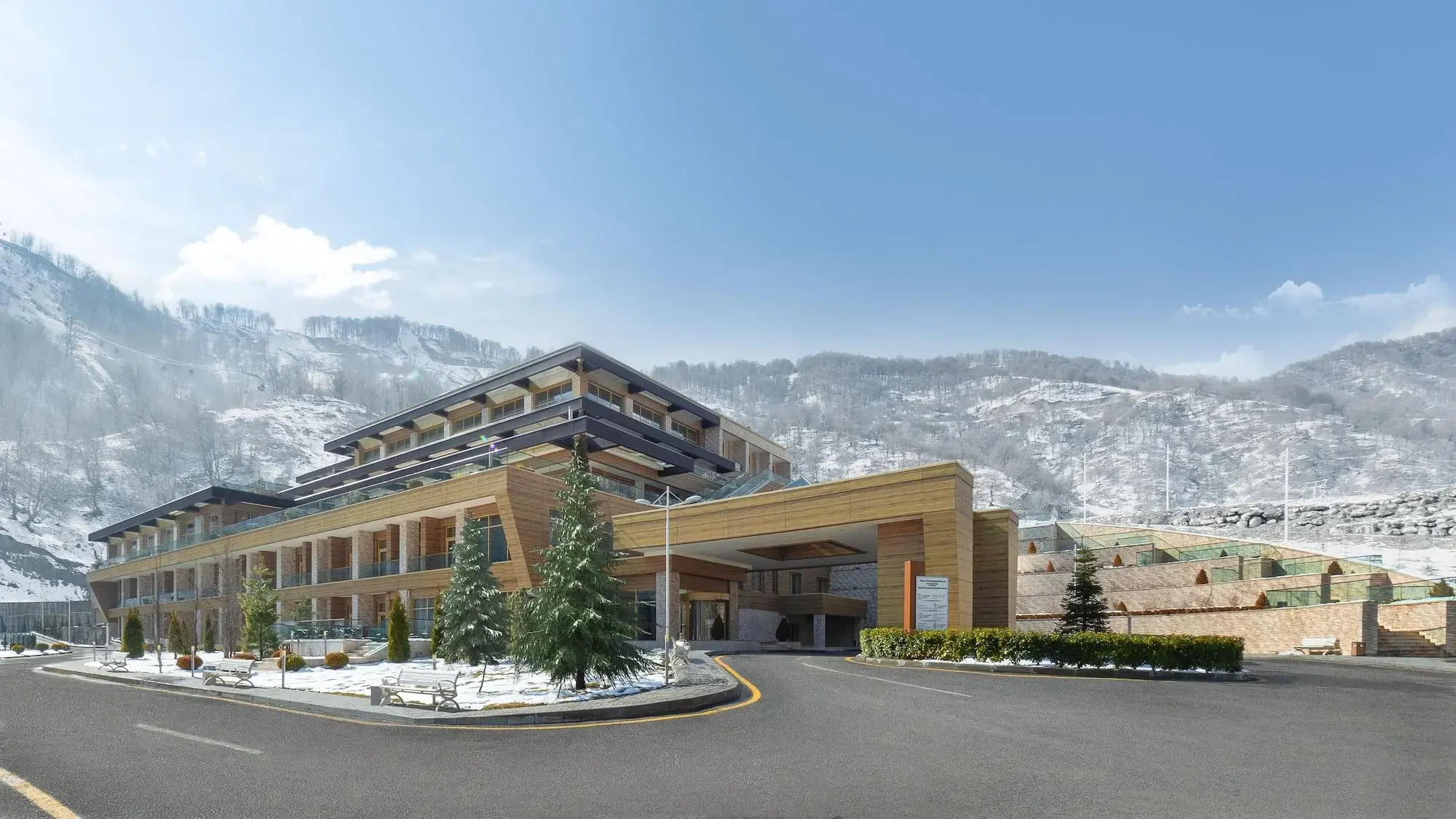 Qafqaz Tufandag Mountain Resort Hotel Qafqaz Tufandag Mountain Resort Hotel in winter, with slight snow on the ground.